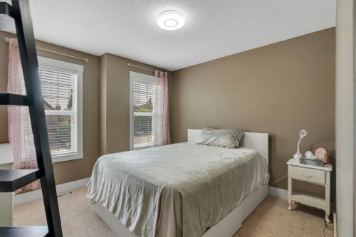 242 Valley Woods Place Nw, Calgary, AB - Indoor Photo Showing Bedroom