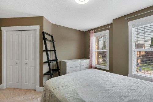 242 Valley Woods Place Nw, Calgary, AB - Indoor Photo Showing Bedroom