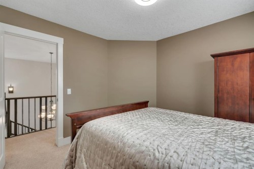 242 Valley Woods Place Nw, Calgary, AB - Indoor Photo Showing Bedroom