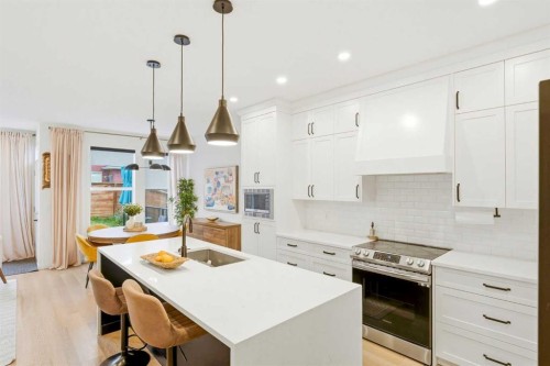 49 Copperhead Road Se, Calgary, AB - Indoor Photo Showing Kitchen With Upgraded Kitchen
