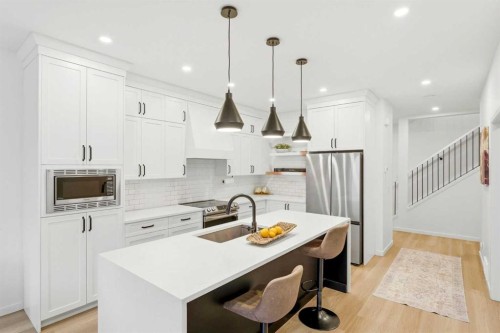 49 Copperhead Road Se, Calgary, AB - Indoor Photo Showing Kitchen With Upgraded Kitchen