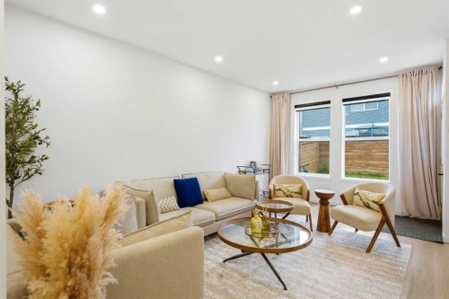 49 Copperhead Road Se, Calgary, AB - Indoor Photo Showing Living Room
