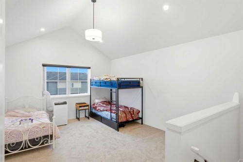 49 Copperhead Road Se, Calgary, AB - Indoor Photo Showing Bedroom