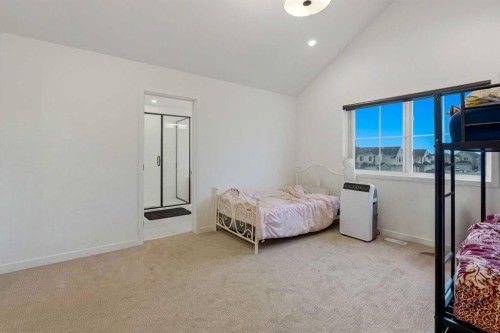 49 Copperhead Road Se, Calgary, AB - Indoor Photo Showing Bedroom