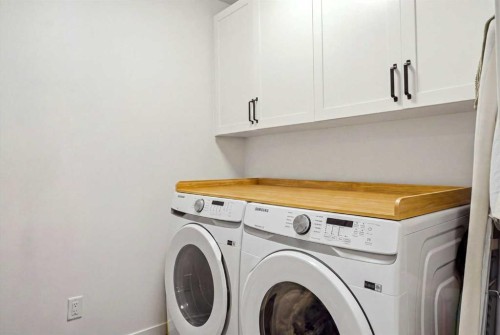 49 Copperhead Road Se, Calgary, AB - Indoor Photo Showing Laundry Room