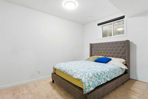 49 Copperhead Road Se, Calgary, AB - Indoor Photo Showing Bedroom