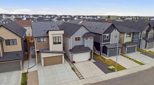 49 Copperhead Road Se, Calgary, AB - Outdoor With Facade