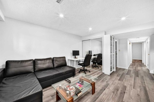 76 Aberfoyle Close Ne, Calgary, AB - Indoor Photo Showing Living Room