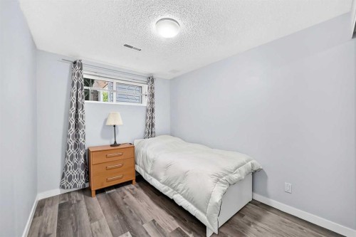 76 Aberfoyle Close Ne, Calgary, AB - Indoor Photo Showing Bedroom