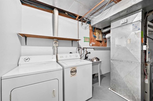 76 Aberfoyle Close Ne, Calgary, AB - Indoor Photo Showing Laundry Room