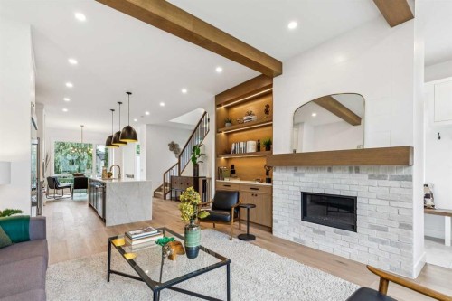 4920 21 Avenue Nw, Calgary, AB - Indoor Photo Showing Living Room With Fireplace