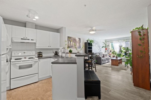 2209-950 Arbour Lake Road Nw, Calgary, AB - Indoor Photo Showing Kitchen