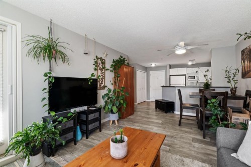 2209-950 Arbour Lake Road Nw, Calgary, AB - Indoor Photo Showing Living Room