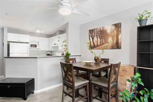 2209-950 Arbour Lake Road Nw, Calgary, AB - Indoor Photo Showing Dining Room