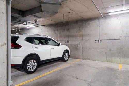 2209-950 Arbour Lake Road Nw, Calgary, AB - Indoor Photo Showing Garage