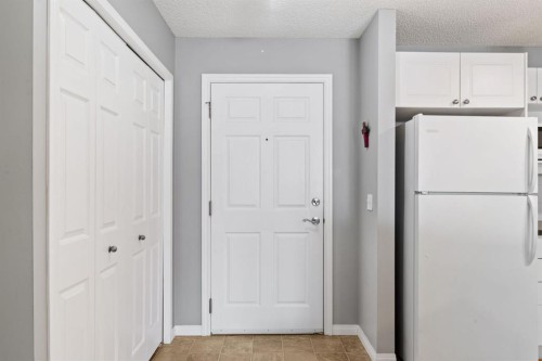 2209-950 Arbour Lake Road Nw, Calgary, AB - Indoor Photo Showing Other Room