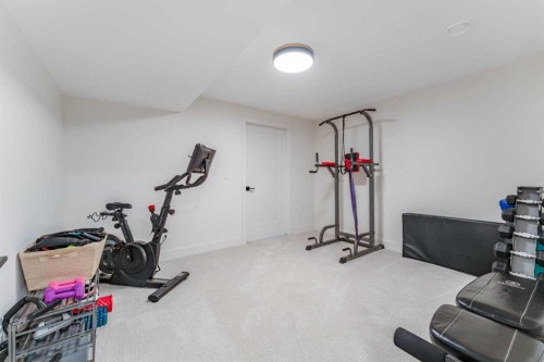 651 Willingdon Boulevard Se, Calgary, AB - Indoor Photo Showing Gym Room
