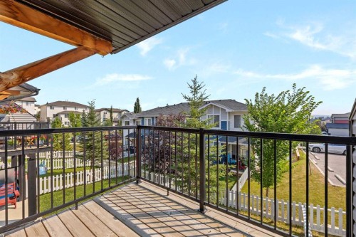 304 Jumping Pound Common, Cochrane, AB - Outdoor With Balcony With Exterior