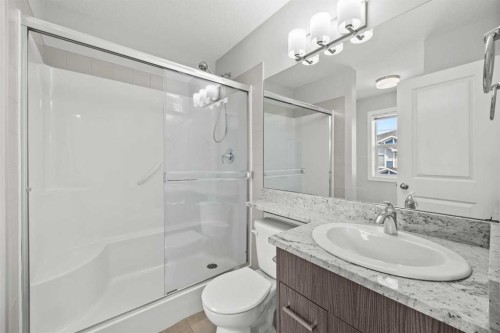304 Jumping Pound Common, Cochrane, AB - Indoor Photo Showing Bathroom