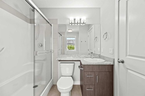 304 Jumping Pound Common, Cochrane, AB - Indoor Photo Showing Bathroom