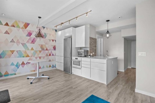 304 Jumping Pound Common, Cochrane, AB - Indoor Photo Showing Kitchen