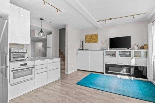 304 Jumping Pound Common, Cochrane, AB - Indoor Photo Showing Kitchen
