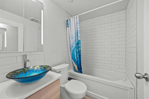 304 Jumping Pound Common, Cochrane, AB - Indoor Photo Showing Bathroom