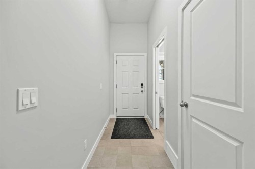 304 Jumping Pound Common, Cochrane, AB - Indoor Photo Showing Other Room