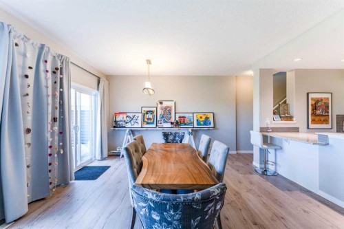 359 Sunrise View, Cochrane, AB - Indoor Photo Showing Dining Room