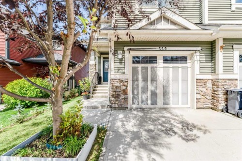 359 Sunrise View, Cochrane, AB - Outdoor With Facade