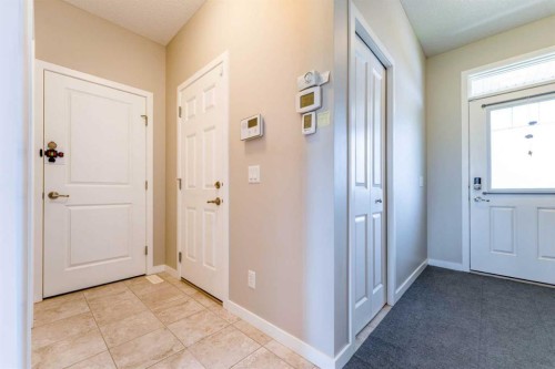 359 Sunrise View, Cochrane, AB - Indoor Photo Showing Other Room