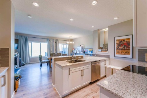 359 Sunrise View, Cochrane, AB - Indoor Photo Showing Kitchen With Double Sink