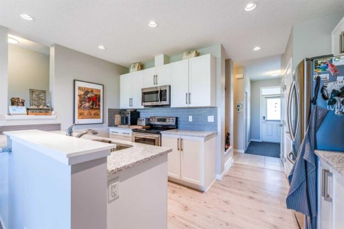 359 Sunrise View, Cochrane, AB - Indoor Photo Showing Kitchen