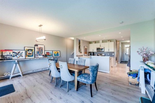 359 Sunrise View, Cochrane, AB - Indoor Photo Showing Dining Room