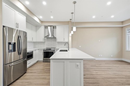 2146-2330 Fish Creek Boulevard Sw, Calgary, AB - Indoor Photo Showing Kitchen With Upgraded Kitchen