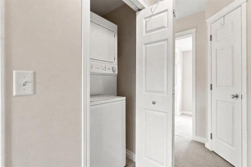 106 Panamount Drive Nw, Calgary, AB - Indoor Photo Showing Laundry Room