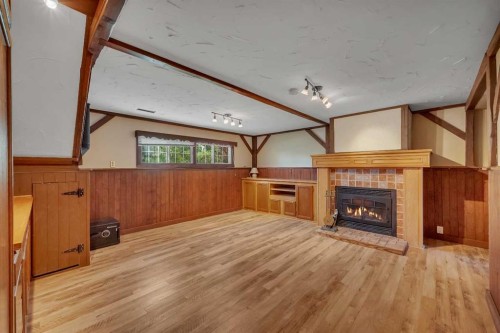 124 Macewan Drive Nw, Calgary, AB - Indoor With Fireplace