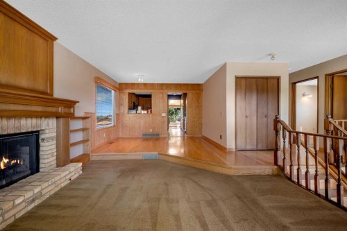 124 Macewan Drive Nw, Calgary, AB - Indoor With Fireplace