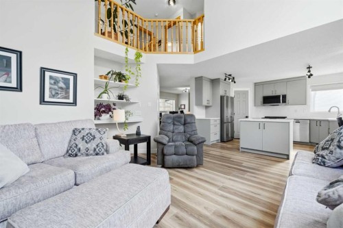 72 Arbour Crest Road Nw, Calgary, AB - Indoor Photo Showing Living Room