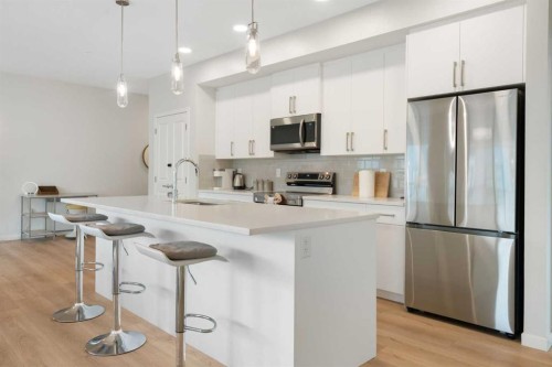 6412-20295 Seton Way Se, Calgary, AB - Indoor Photo Showing Kitchen With Stainless Steel Kitchen With Upgraded Kitchen