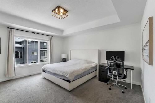 202 Kinniburgh Crescent, Chestermere, AB - Indoor Photo Showing Bedroom