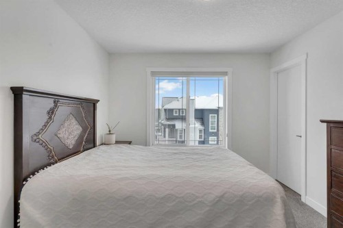 202 Kinniburgh Crescent, Chestermere, AB - Indoor Photo Showing Bedroom