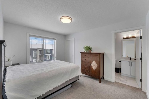 202 Kinniburgh Crescent, Chestermere, AB - Indoor Photo Showing Bedroom