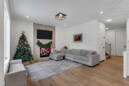 202 Kinniburgh Crescent, Chestermere, AB - Indoor Photo Showing Living Room