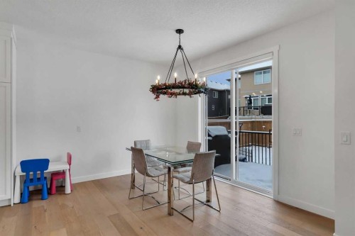 202 Kinniburgh Crescent, Chestermere, AB - Indoor Photo Showing Dining Room