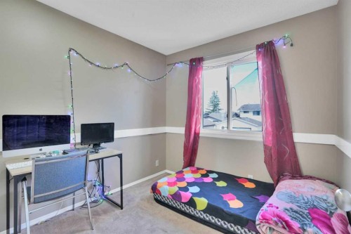 95 Castlegreen Close Ne, Calgary, AB - Indoor Photo Showing Bedroom