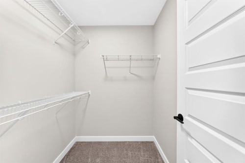 1069 Bayview Crescent Sw, Airdrie, AB - Indoor With Storage