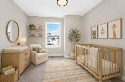 1069 Bayview Crescent Sw, Airdrie, AB - Indoor Photo Showing Bedroom