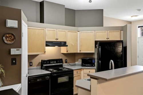 140 Promenade Way Se, Calgary, AB - Indoor Photo Showing Kitchen
