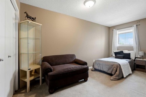 140 Promenade Way Se, Calgary, AB - Indoor Photo Showing Bedroom